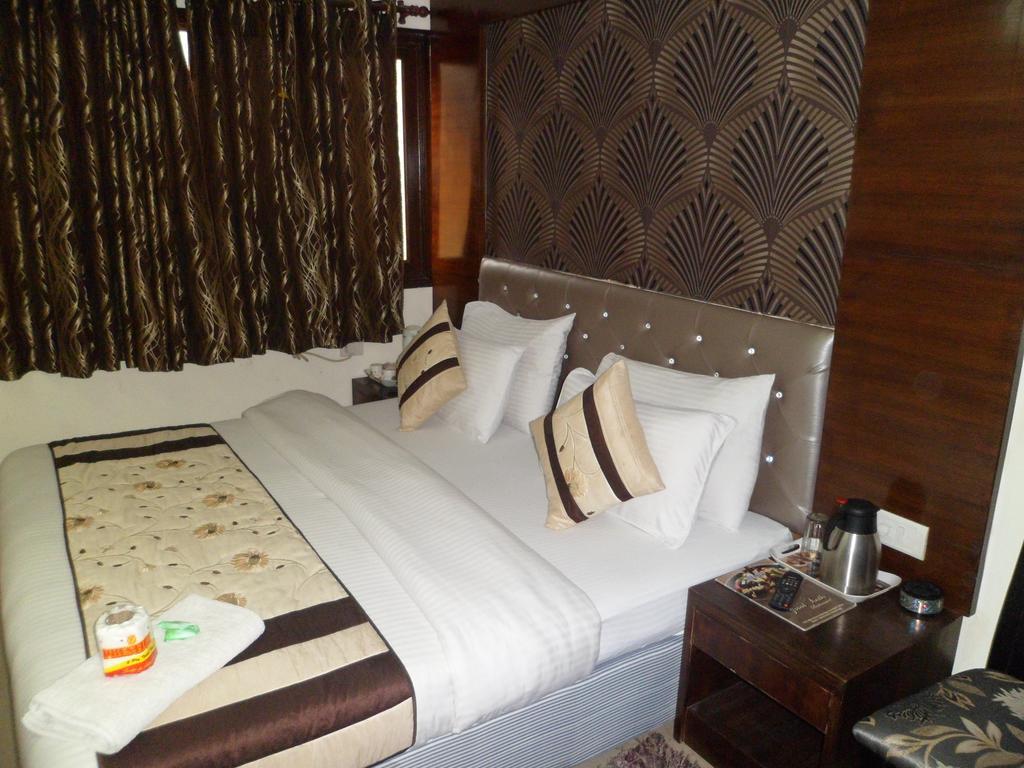 ניו דלהי Hotel Arjun חדר תמונה
